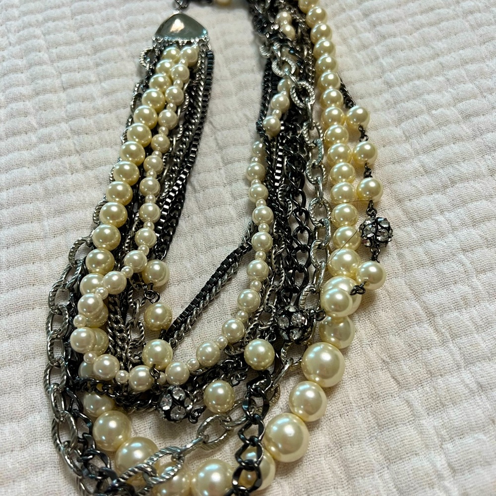 Multi layered pearl, silver and crystal necklace.